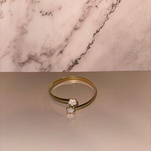 Elegant Gold and White Floral Bracelet